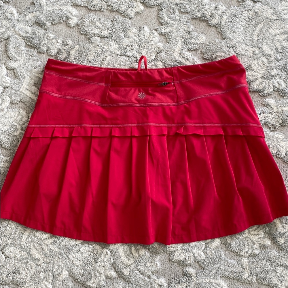 Athleta size M cranberry/cherry Skort excellent condition. No pulls/stains